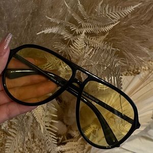 black sunglasses with yellow lens